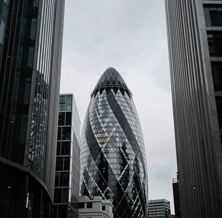 Low-angle high-contrast architectural crop of London's tech corridor buildings against a cool overcast sky, sharp shadows, desaturated tones, 35mm grain