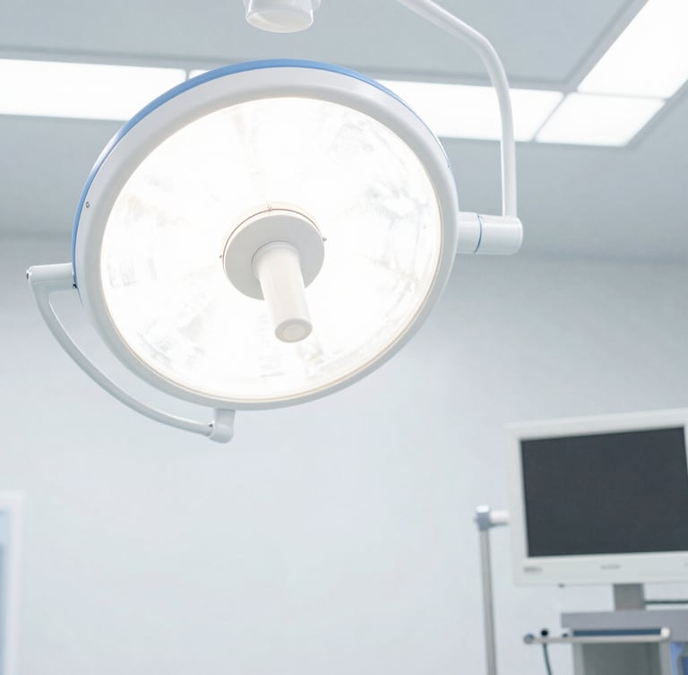 Bright high-key clinical photography of a modern sterile operating room, a high-precision surgical tower on the right, crisp studio light, sharp macro focus.