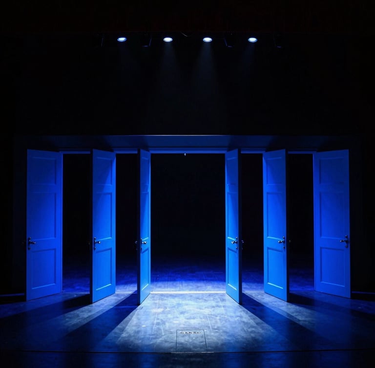 Wide-angle dramatic production photography of an empty arena stage right before doors open, glowing with electric blue lighting, deep shadows, sharp focus, 35mm.