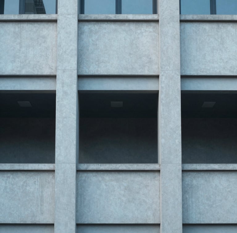 Symmetric architectural detail of a modern civic building, clean concrete lines, cool diffused daylight, 35mm lens