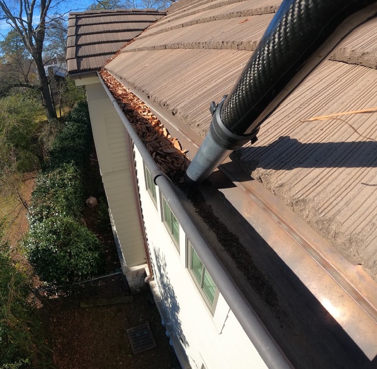 gutter cleaning with a gutter vac