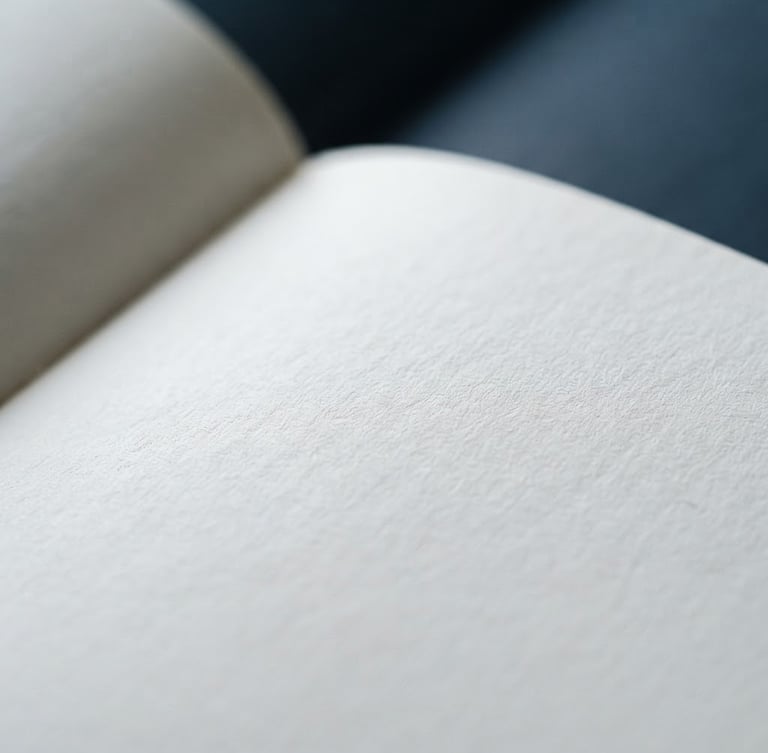 Macro photograph of a printed book page, sharp focus on academic typography, cool diffused daylight, deep navy tones, 35mm lens