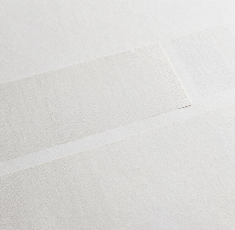 Extreme close-up flat-lay detail of a photocomposite artwork by Clare Newton, showing textured layers, subtle digital brushwork, and physical interventions, soft diffused gallery lighting, high-resolution archival detail, 35mm