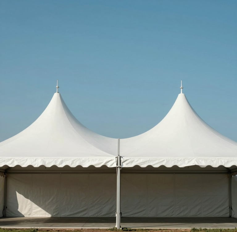 Symmetrical architectural shot of a massive, pristine white event tent structure erected under a clear blue sky, clean lines, bright daylight.