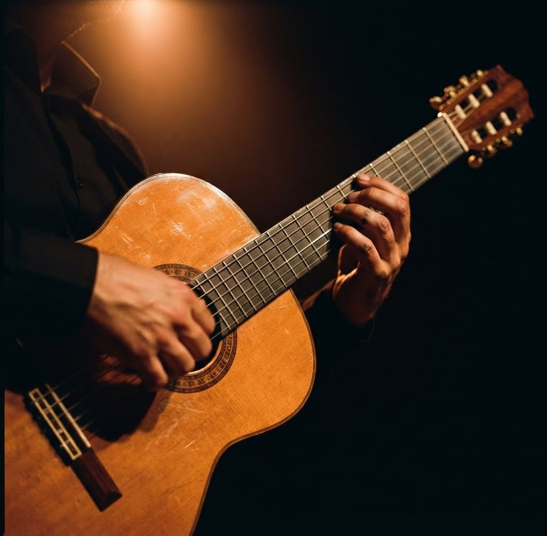 Dramatic stage photography, close-up of a classic Spanish guitar under a warm copper spotlight, deep shadows, rich gold flares, cinematic 35mm
