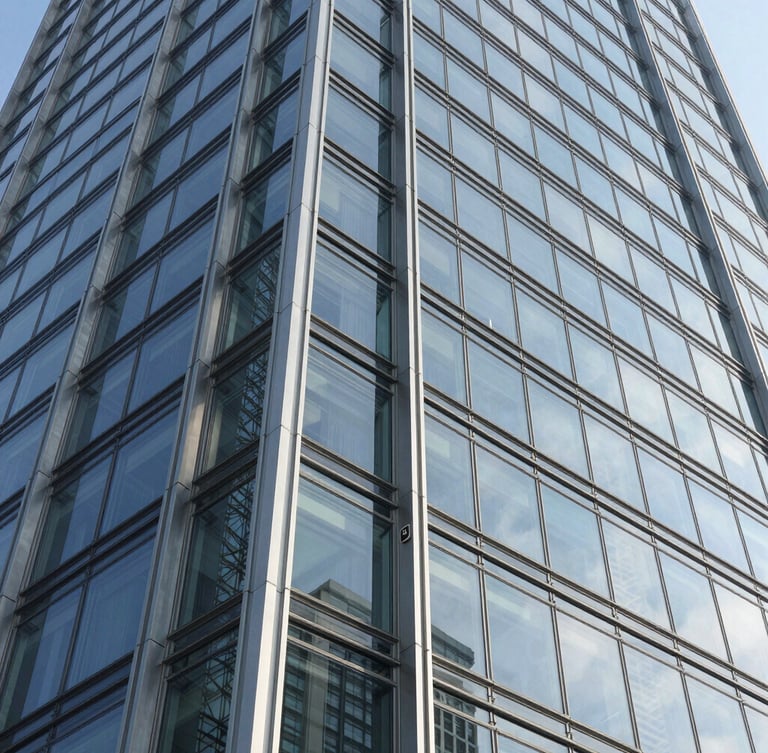 Macro shot of a structural glass joint on a modern skyscraper facade, crisp natural daylight, sharp geometric shadows, steel and glass textures, wide-angle lens