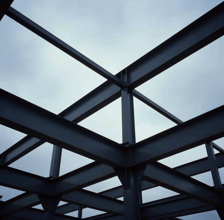Low-angle heroic shot of structural steel frameworks against a dramatic cool overcast sky, industrial scale, 35mm film