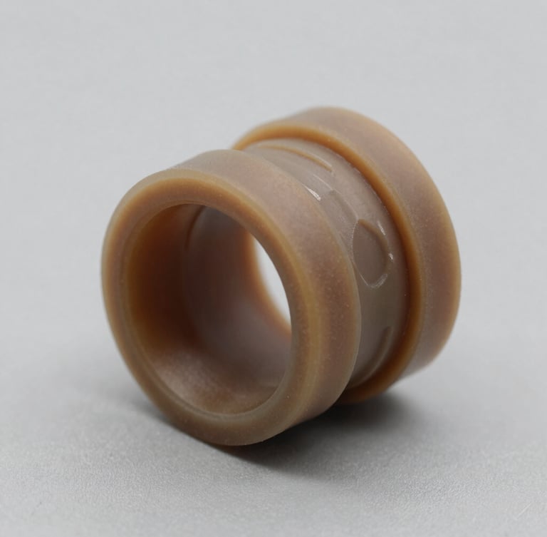 Macro studio photograph of a custom-machined elastomer seal profile with clean geometric cross-section, sharp lighting highlighting technical tolerances