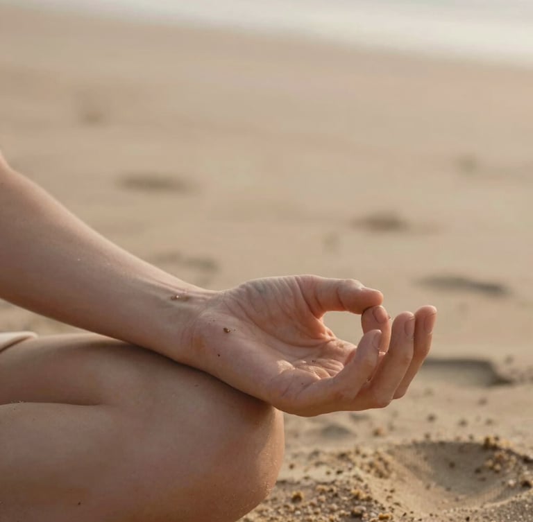 Close-up of hands in a quiet mudra, resting on warm sand-colored fabric, soft morning daylight, shallow depth of field, 35mm editorial photography.