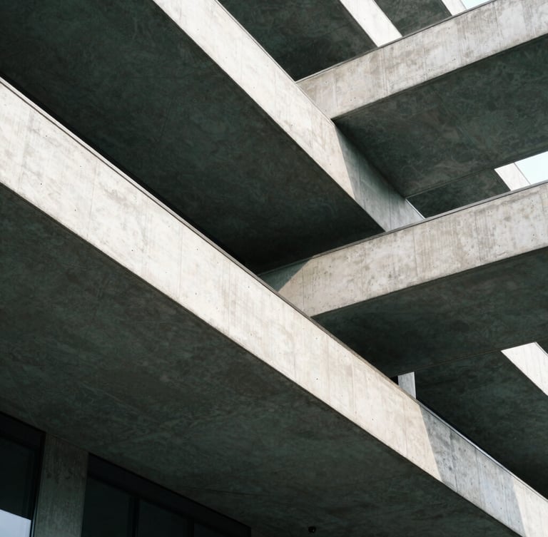 Tight geometric crop of concrete and steel architectural lines, sharp shadows, clean daylight, architectural framing, 35mm