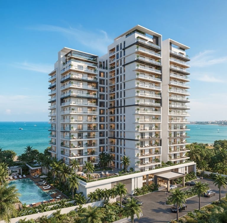 Wide architectural shot of a modern premium apartment building in Kakinada under bright clear coastal daylight, crisp white plastering, wide glass balconies, clean blue sky.