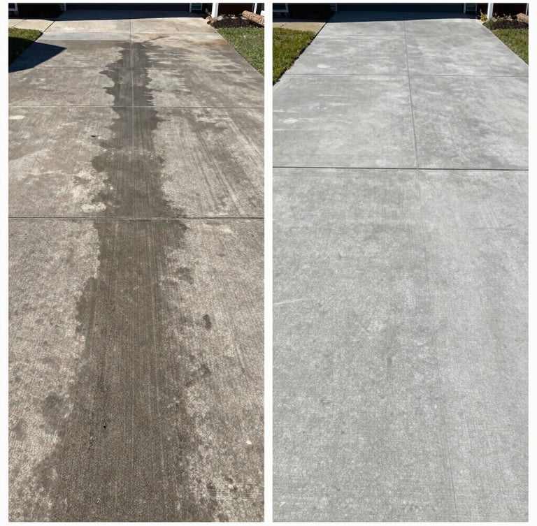 Split-screen before and after of a concrete driveway. Left side is dark, oil-stained, and covered in black grime. Right side is bright, clean, restored concrete, sharp focus, direct midday sunlight.