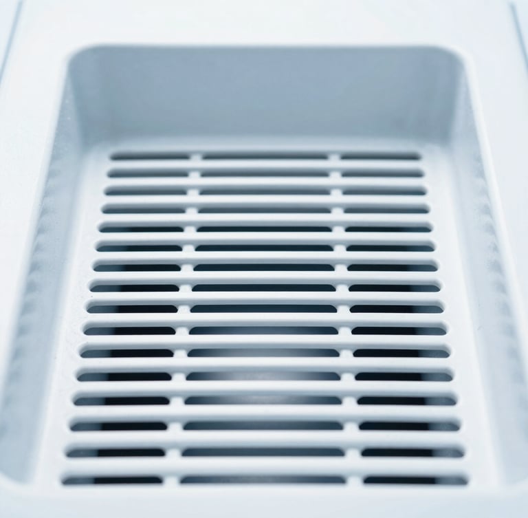 Straight-on clean ventilation grate interior, clinical white and cool blue tones, bright daylight, 35mm lens