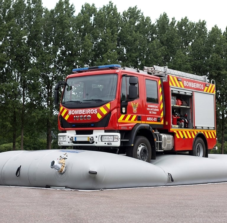a red fire engine parked on water bags