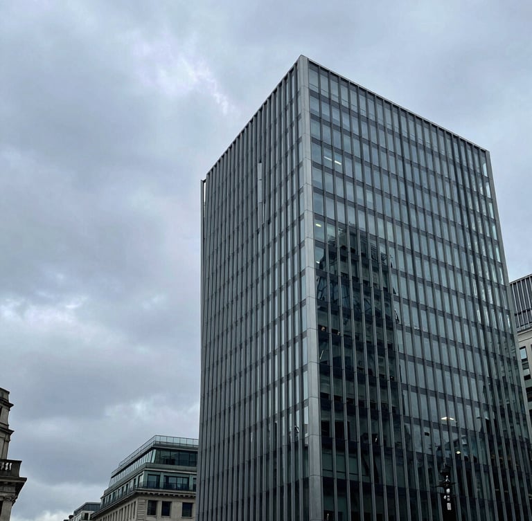 Wide panoramic architectural shot of One Coleman Street in the City of London, steel and glass facade under a cool overcast sky, sharp angles, negative space on the left