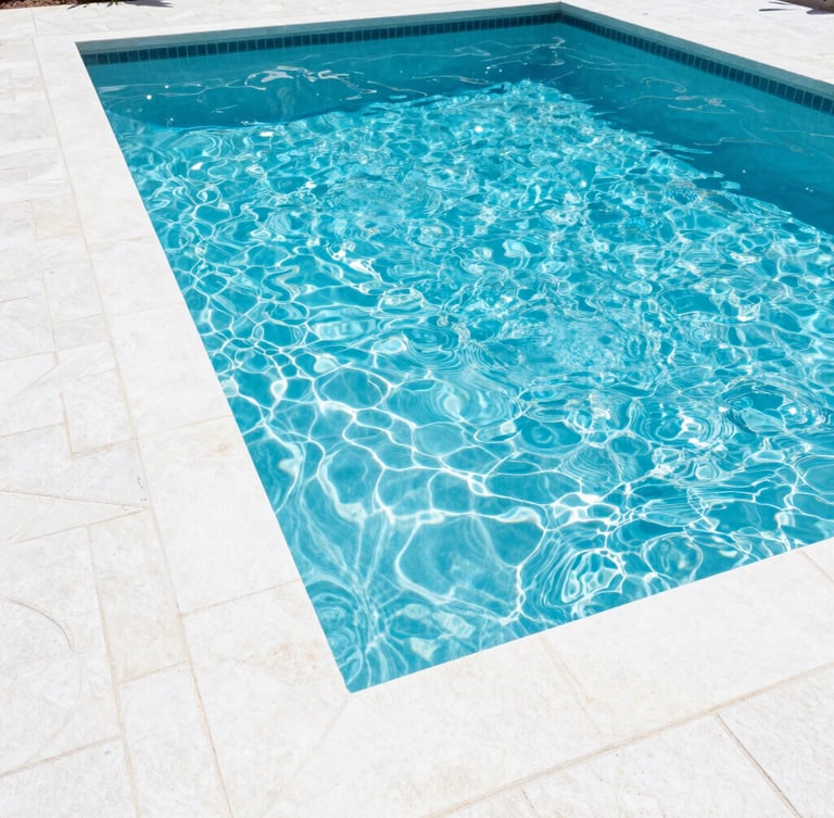 Bright high-key photography of a sparkling residential pool in Orlando, crisp midday Florida sunlight, clean white stone deck, vibrant blue water ripples, 35mm