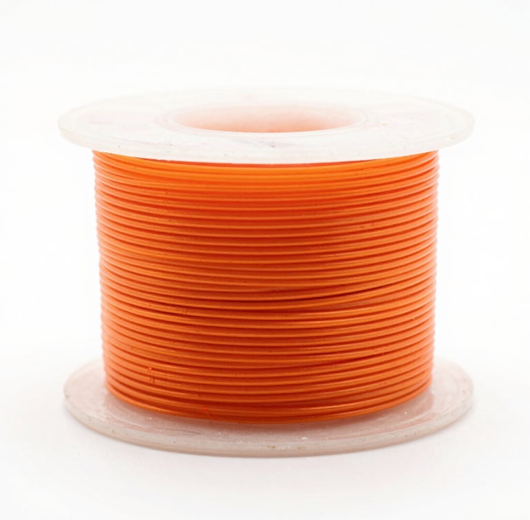 High-key macro photograph of a perfectly wound neon orange filament spool on a pure white background, showcasing flawless parallel layers under clinical studio lighting.