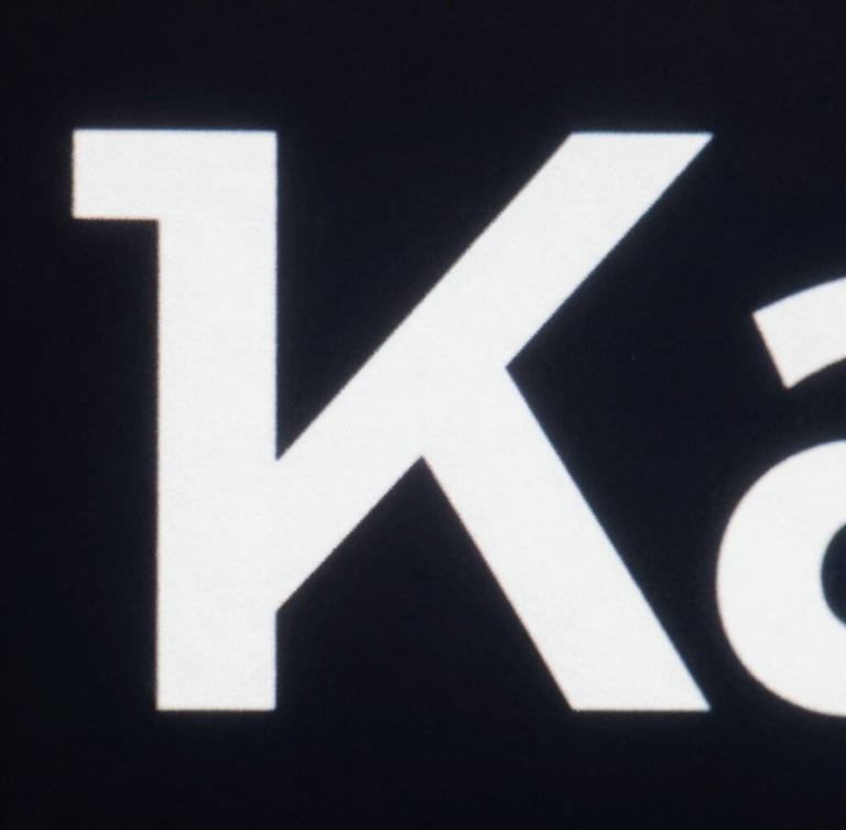 Extreme close-up of a high-fidelity interface, stark white typography on dark background, sharp defined shadows, portrait orientation.