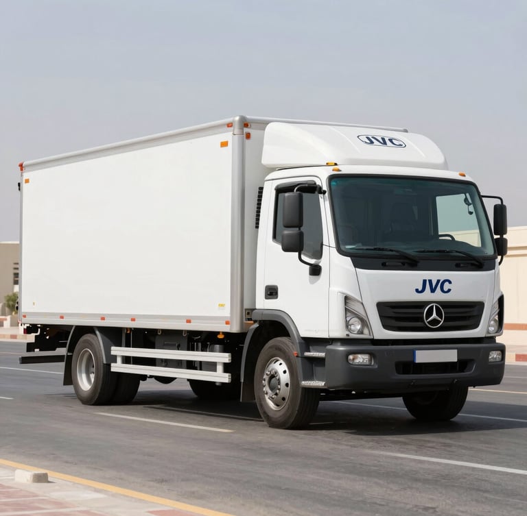 Wide shot of a pristine Gulf Link moving truck parked in JVC Dubai, bright natural daylight, clean editorial photography style, 35mm lens