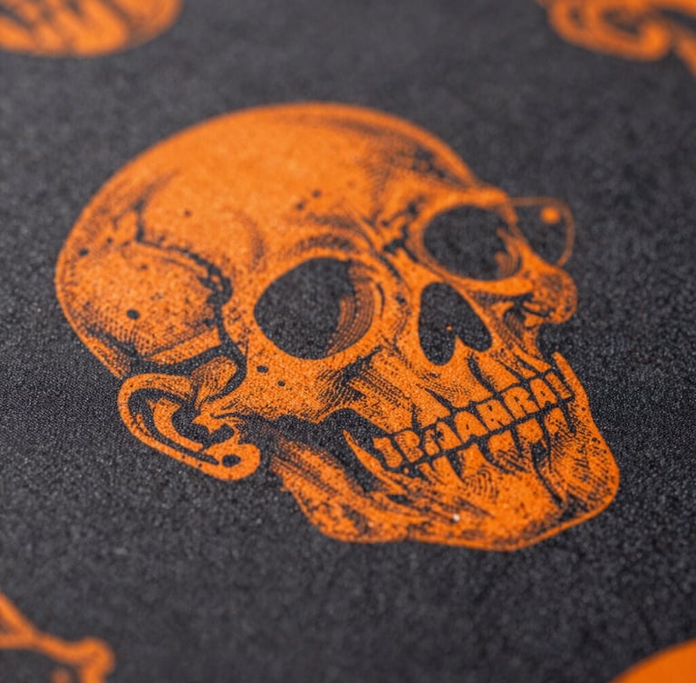 Extreme macro shot of a vibrant DTF print transfer on dark fabric, crisp details, high contrast studio lighting, orange highlights