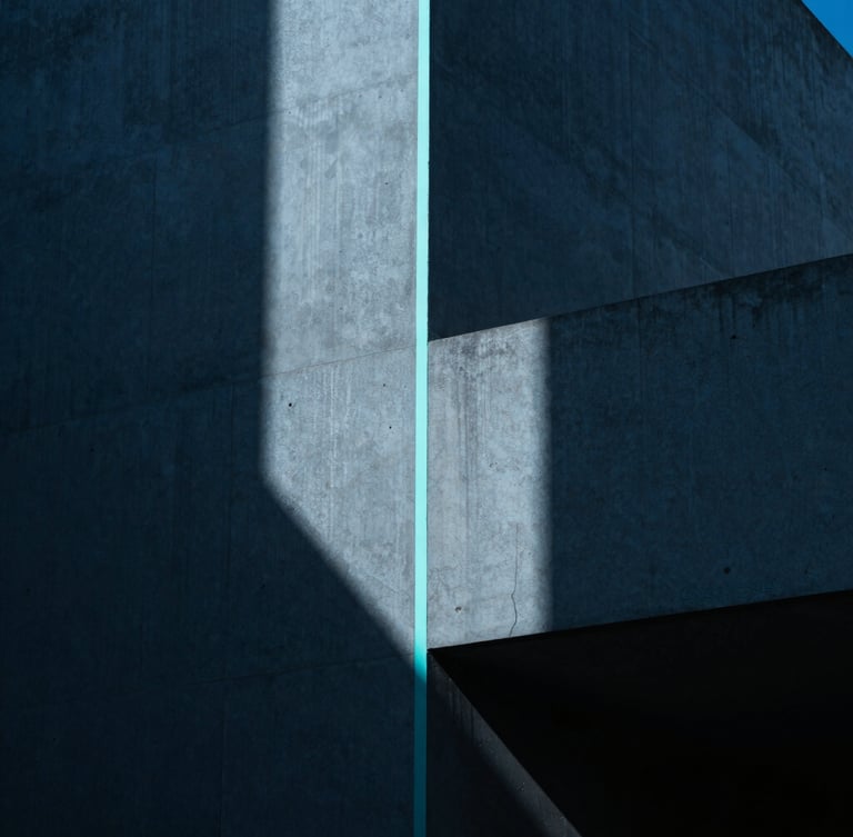 Moody architectural photography of clean minimalist concrete geometry with a sharp neon cyan light line running vertically, dramatic shadows, 35mm lens