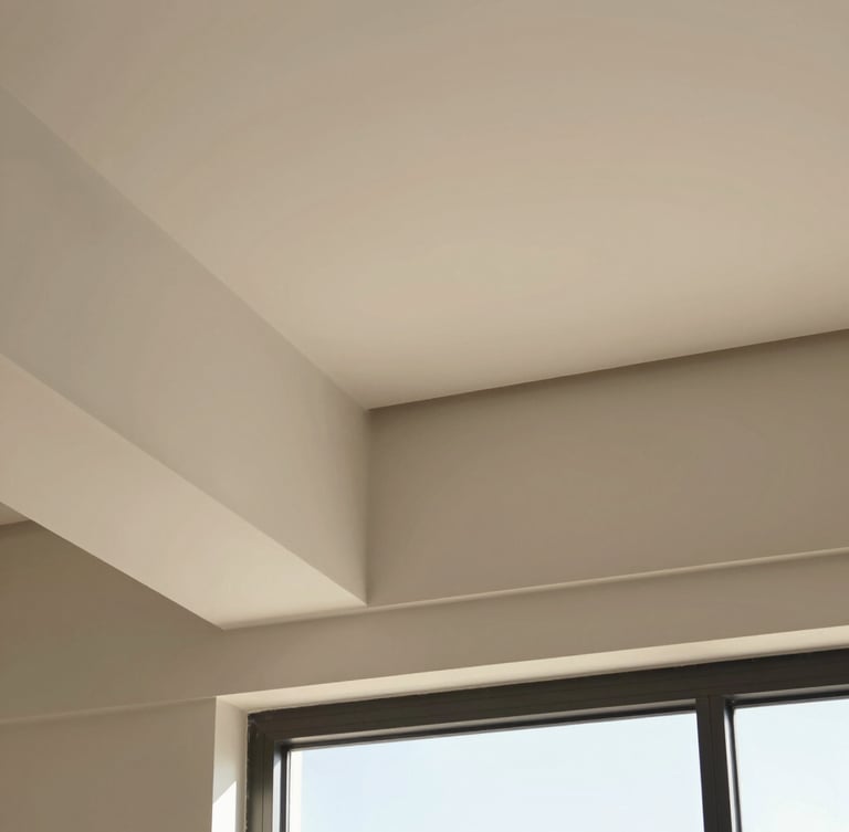 Close-up of a premium matte-finish PVC ceiling joint with clean architectural alignment, bright natural daylight, warm neutral tones, sharp focus