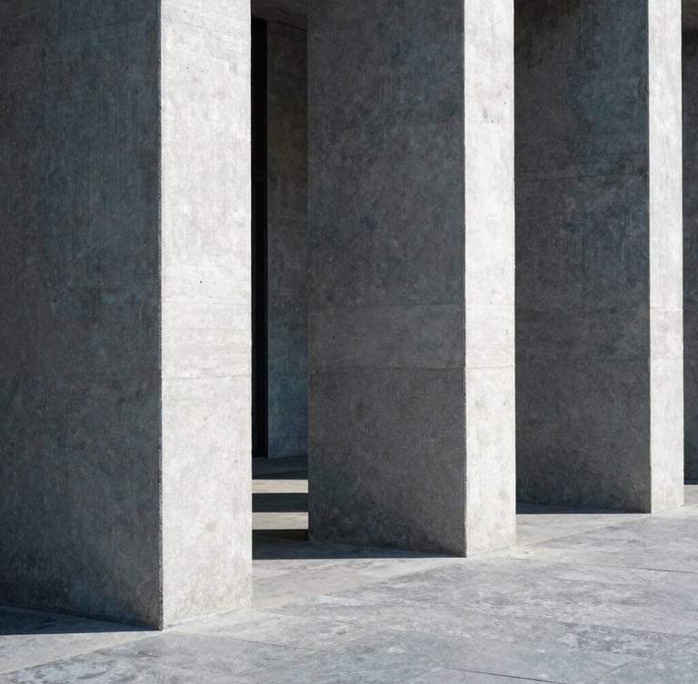 A minimalist architectural shot of structured concrete columns casting sharp, high-contrast shadows in bright daylight, cool slate tones, 35mm.