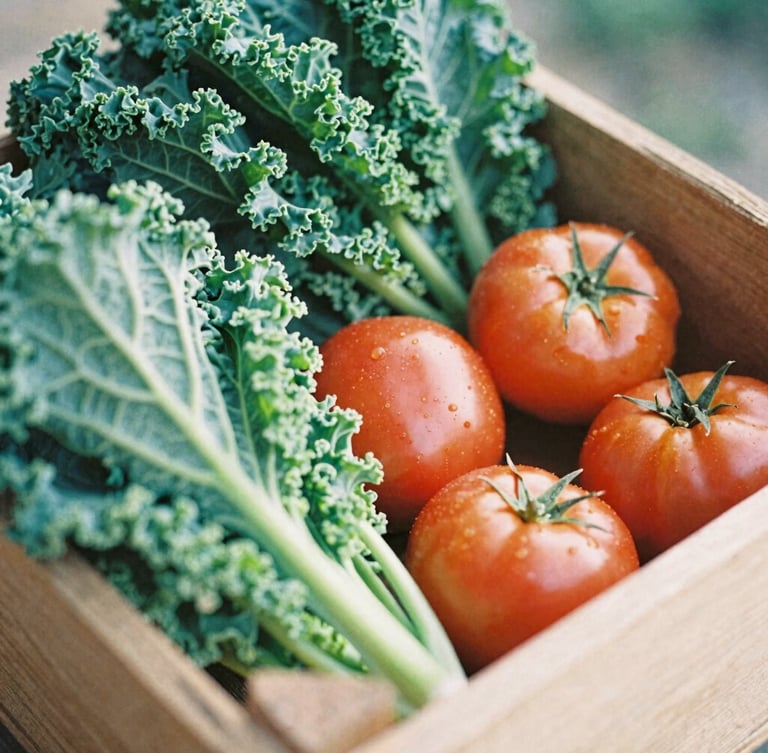 Close-up of fresh-picked local produce, including crisp green kale and bright red heirloom tomatoes, in a rustic wooden crate under soft morning daylight, 35mm film look.