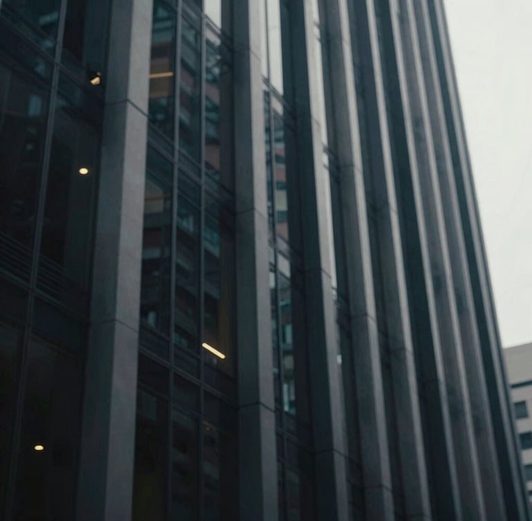 Perspective view of a modern steel and glass skyscraper facade in Mexico City, cool daylight, shallow depth of field, 35mm