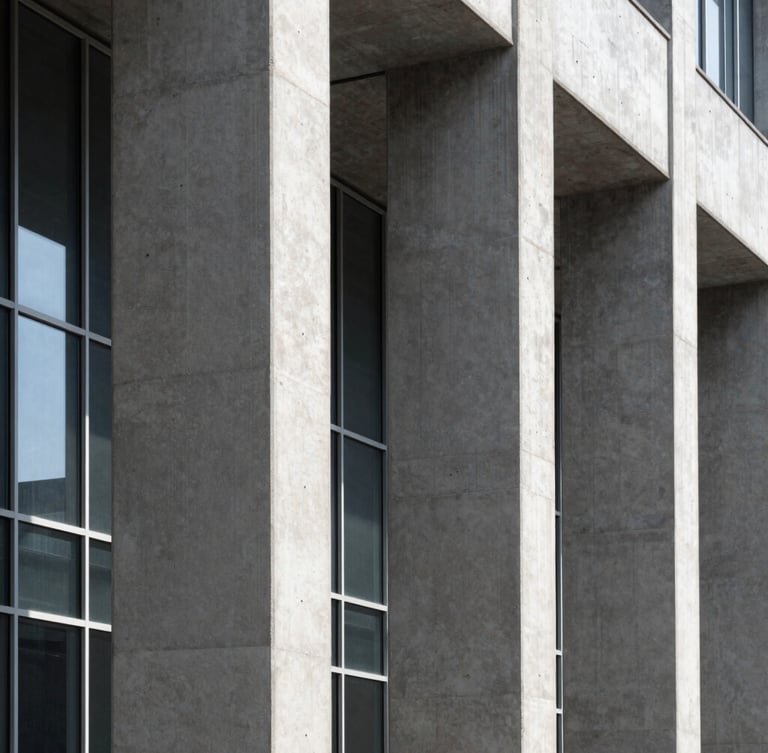 Stark high-contrast architectural detail of concrete columns and glass panels, clinical lighting, deep shadows, capturing structured engineering