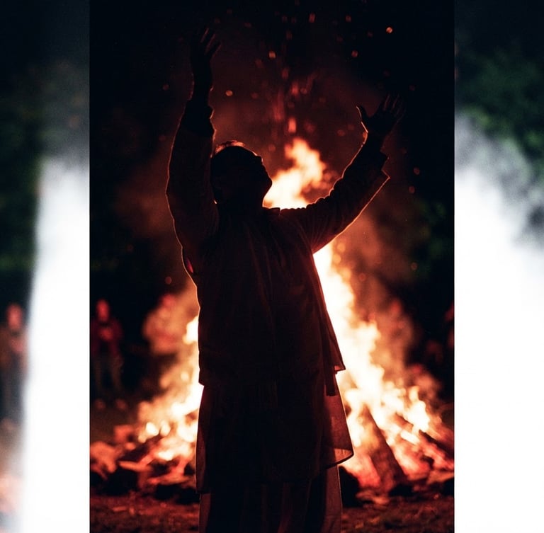 Low-angle dramatic editorial photography of a passionate worshiper with raised hands silhouetted against a deep crimson and gold firelight glow, high-contrast shadows, 35mm