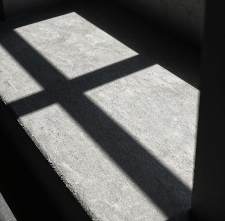 extreme close-up of sharp geometric architectural shadows on concrete, high-contrast natural light, cool tones
