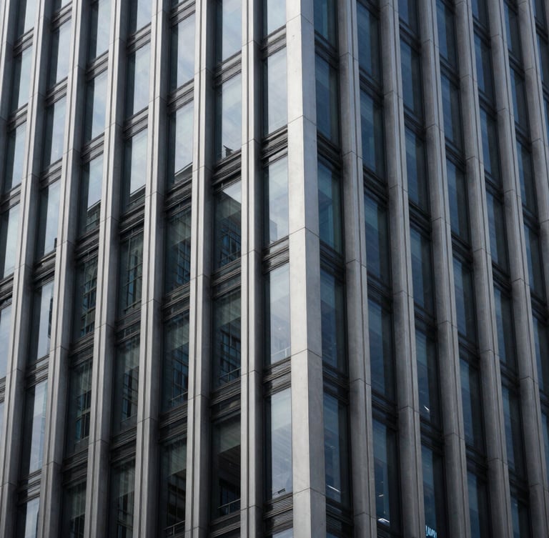 Abstract architectural detail of a modern corporate skyscraper facade with steel and dark glass panels, cool high-contrast lighting, sharp angles, minimalist composition.