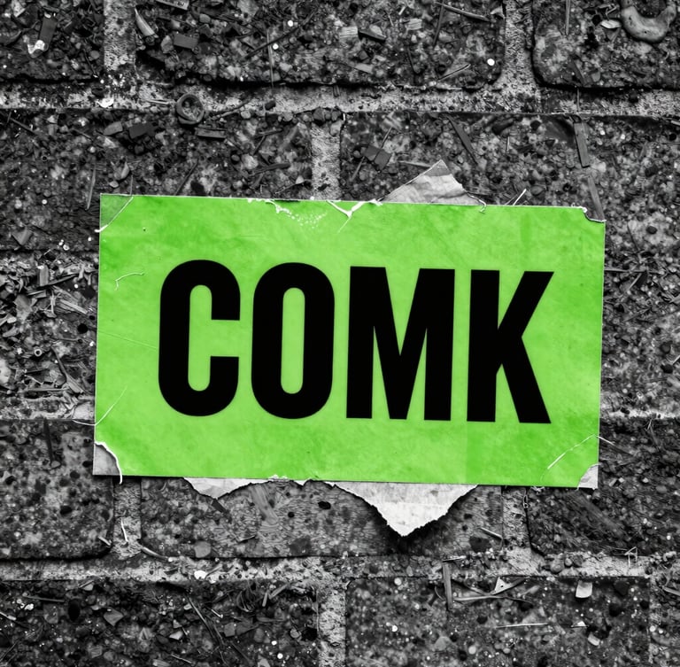 Extreme close-up, high-contrast black and white flash photography of a physical brand asset (e.g., a gritty, worn-out, acid-green branded sticker peeling off a brick wall in a Birmingham alley), direct harsh light, wide-angle lens, brutalist aesthetic.