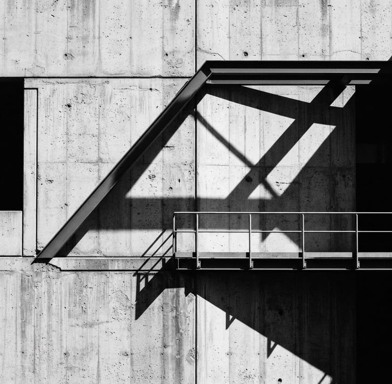 Minimalist architectural photography of a raw concrete wall with sharp geometric shadows, natural light, high contrast, 35mm