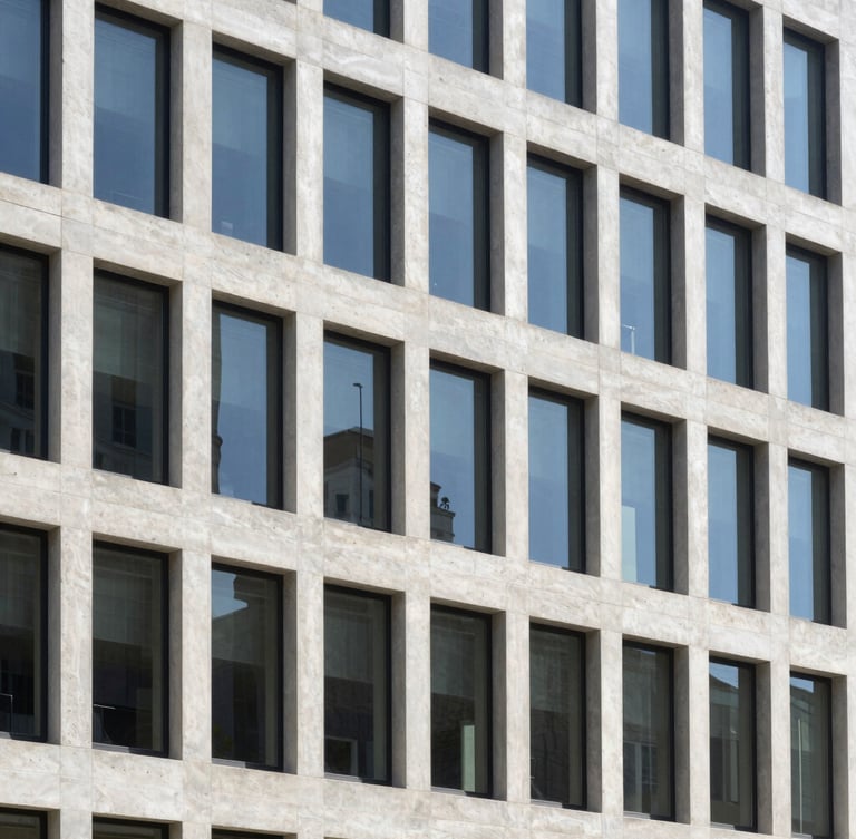 Crisp architectural lines of a modern concrete and glass office building, bright natural daylight, slate tones, 35mm photography