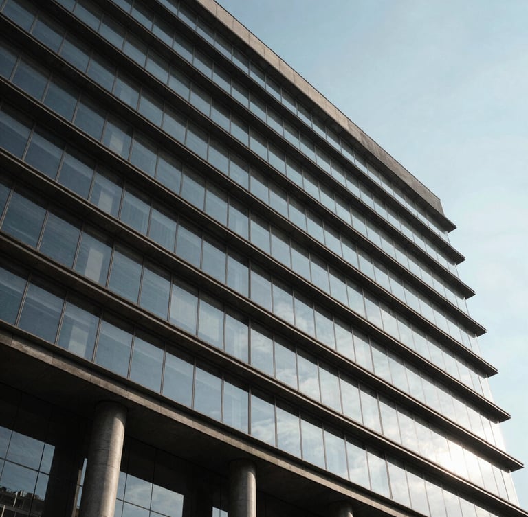 Architectural low-angle shot of a modern government office building facade in Mexico, clean glass and dark concrete lines, dramatic shadows under a clear sky.