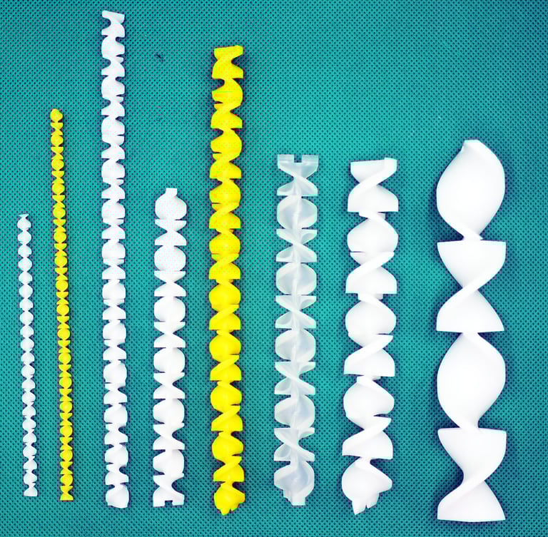 Helical mixers with different lengths, different diameters, and different materials.