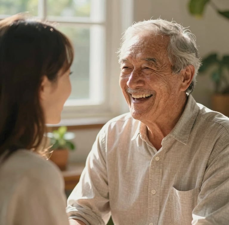 A warm editorial photograph of an elderly father laughing with his adult daughter in a sunlit garden, shallow depth of field, 35mm