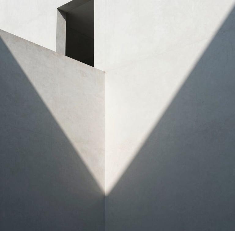 Minimalist modern Hong Kong architecture, sharp directional light casting long geometric shadows on clean white concrete walls, high contrast, editorial look