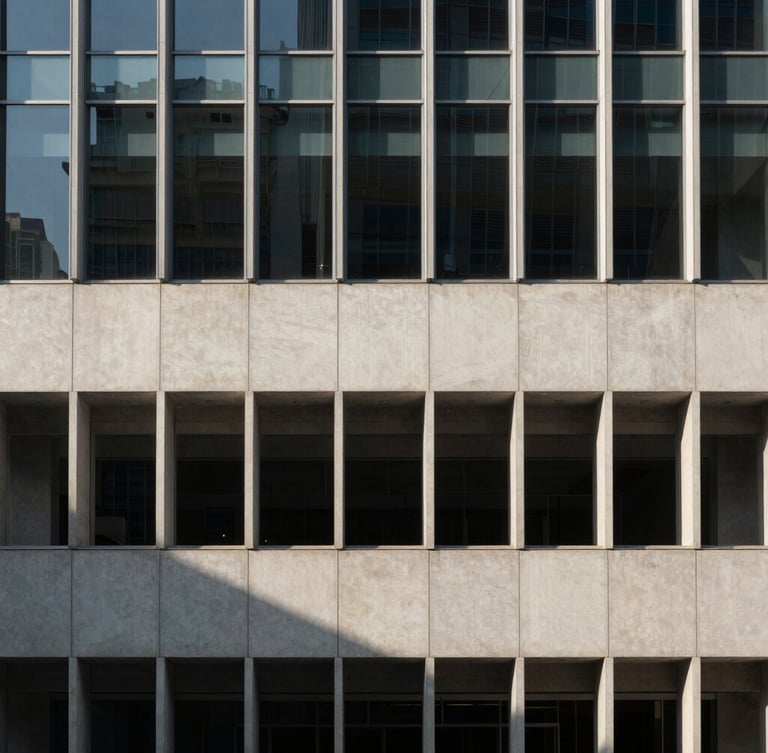 Minimalist modern Hong Kong architecture facade with sharp, directional morning light creating distinct linear shadows on concrete and glass, wide angle