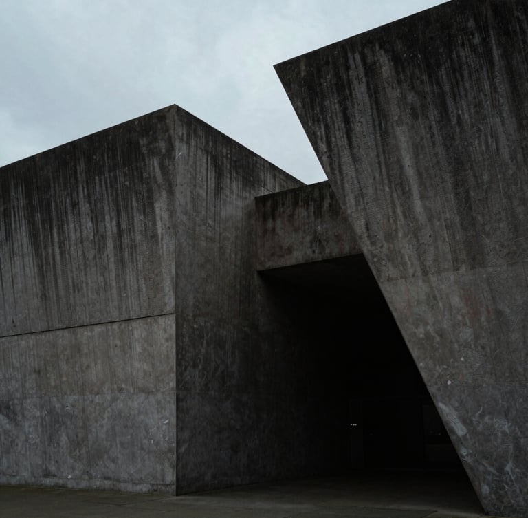 Overcast daylight view of stark architectural concrete geometry in London, deep shadows, high-contrast moody editorial photography, letterbox format.