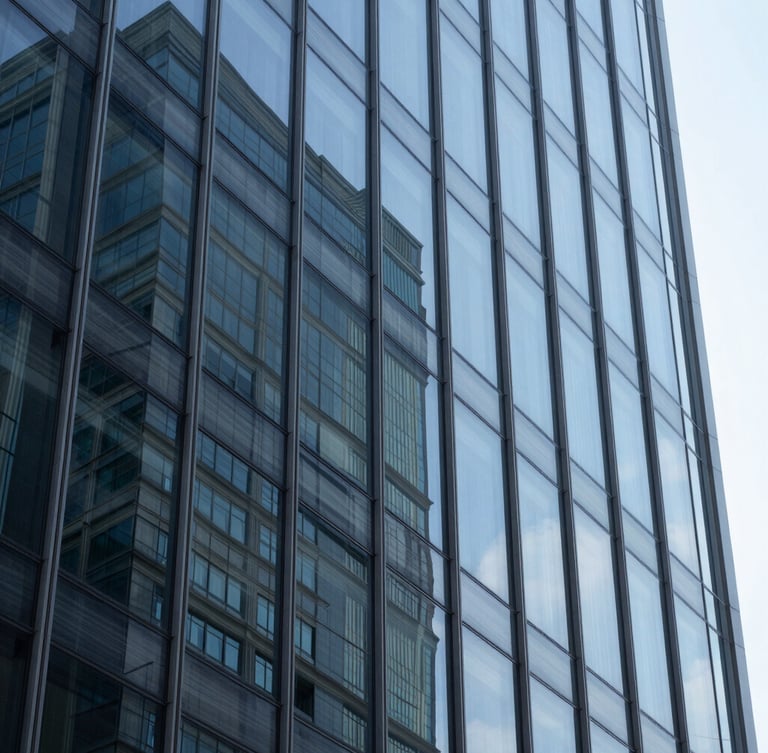 Macro shot of abstract geometric glass reflections on a modern corporate skyscraper, cool daylight, sharp focus, blue and slate tones.