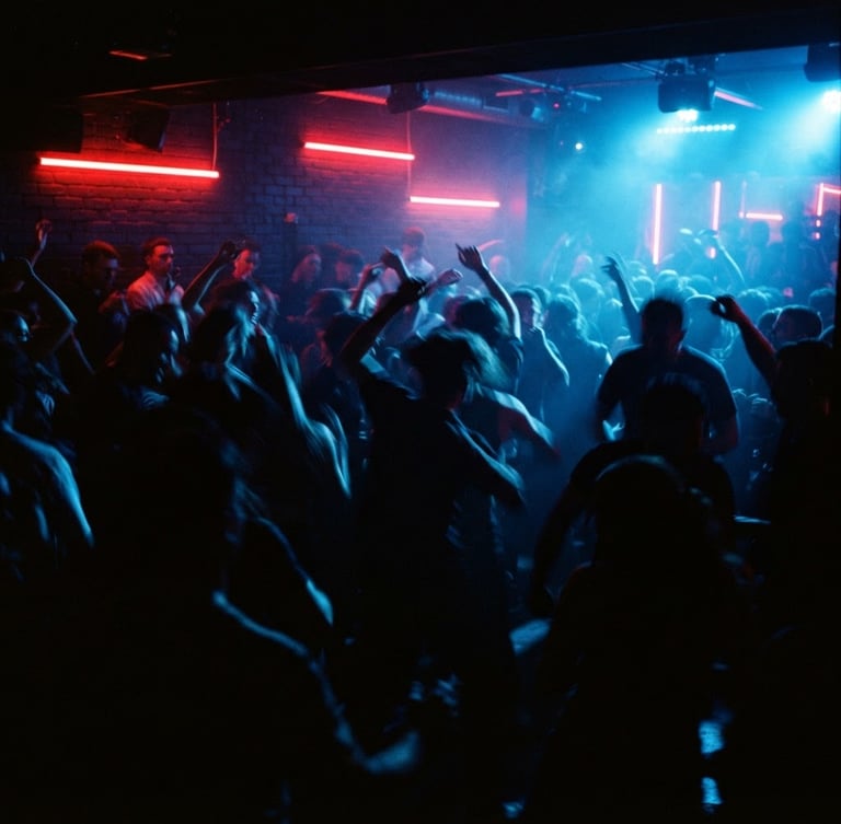 Silhouette of a crowd dancing in high-contrast shadows under electric blue and sharp red neon lights, motion blur, 35mm lens