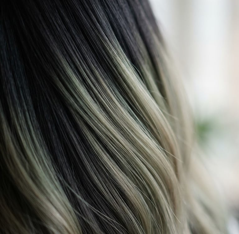 Close-up of clean hair texture with soft-focus color transition, elegant editorial photography, soft natural window light, shallow depth of field