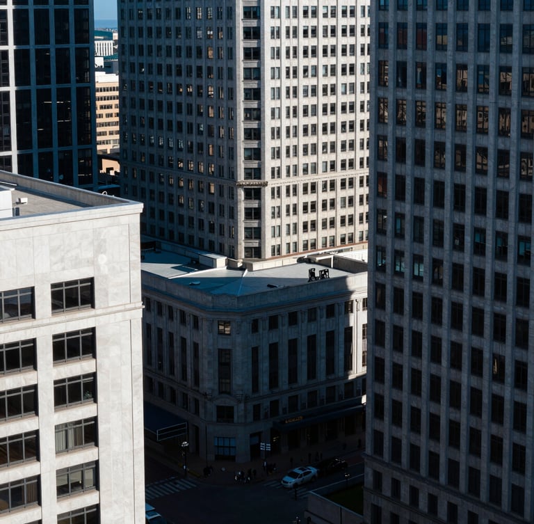 High-altitude urban geometry of downtown St. Petersburg, crisp daylight, sharp shadows, deep blue tones, 35mm lens.