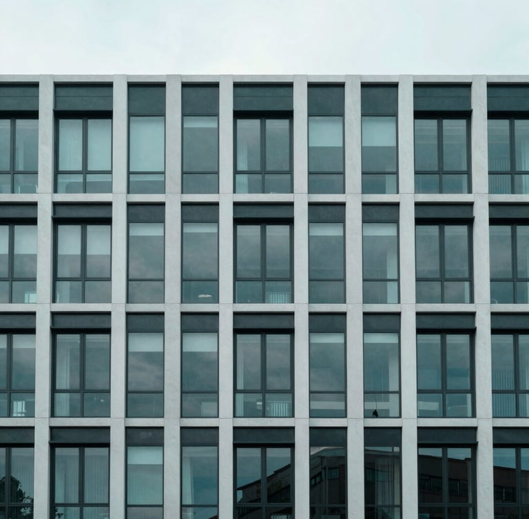 Wide environmental architectural shot of a modern UK commercial property facade, clean corporate lines, overcast daylight, desaturated teal tones.