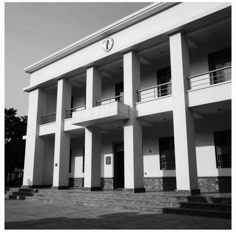 Stark monochrome architectural photography of modern Indian legal chambers, low-angle, sharp focus, deep shadows, high-contrast directional light, 35mm