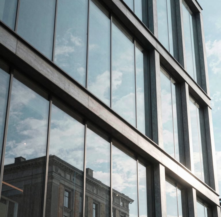 Macro shot of modern architectural glass and steel in Helsinki, cool natural Nordic daylight, crisp shadows, 35mm