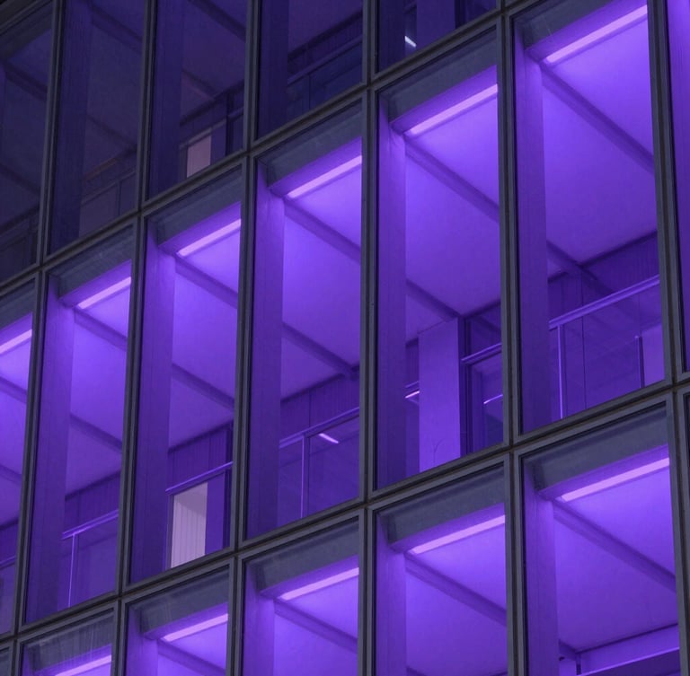 Macro shot of structured architectural glass facade reflecting cool violet neon light, clean lines, high contrast.